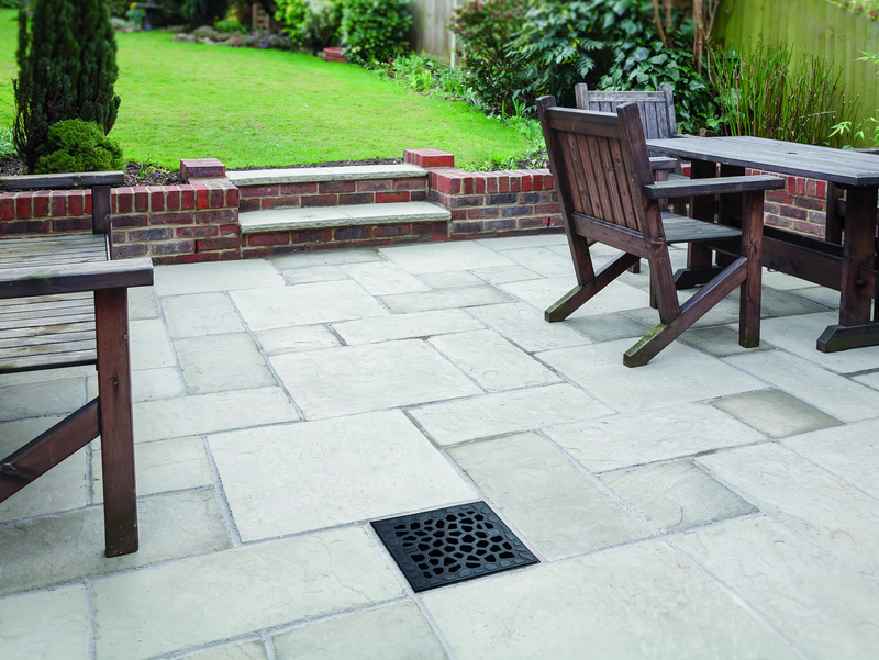 New stone garden patio in backyard, UK